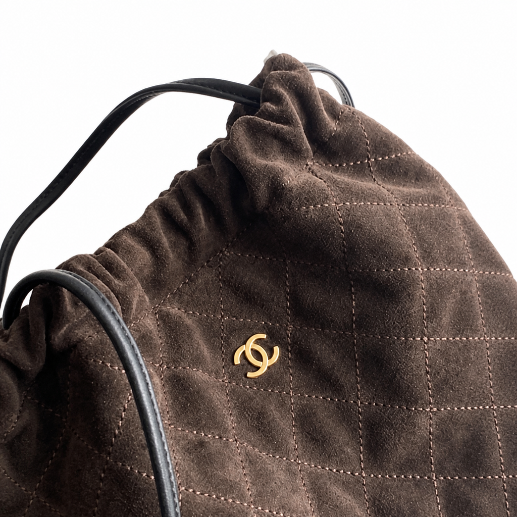 Chanel Chocolate Quilted Suede Drawstring Bucket | Black Cords & Bordeaux Interior — 22cm