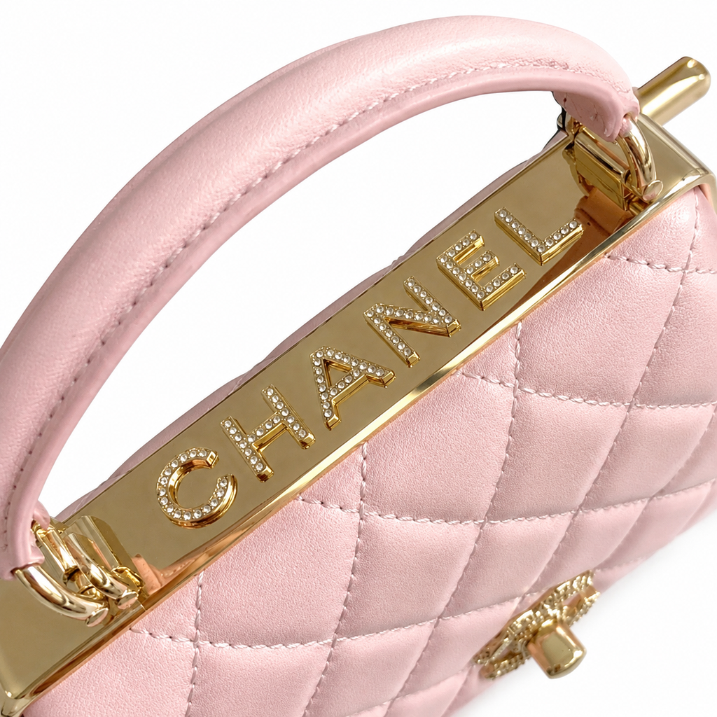 Chanel Sakura Pink Quilted Flap Bag | Crystal Pavé CHANEL Letter Frame Bar, Cylindrical Top Handle & Satin Interior